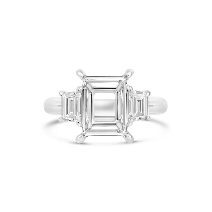 Rings Engagement Collections Platinum Three Stone Ring with Trapezoid Diamond Sides for Emerald Cut Center Rings Engagement Collections Platinum Three Stone Ring with Trapezoid Diamond Sides for Emerald Cut Center